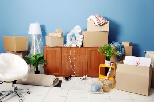 Man and van removals team assisting with a Chelsea flat move