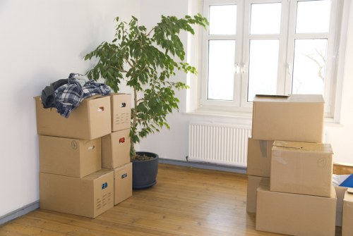 Professional movers handling office furniture in Chelsea
