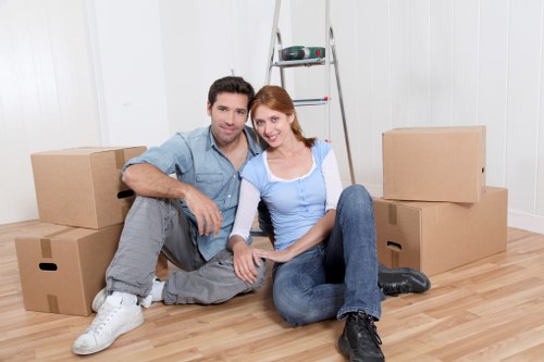 Professional mover handling boxes for a Chelsea relocation