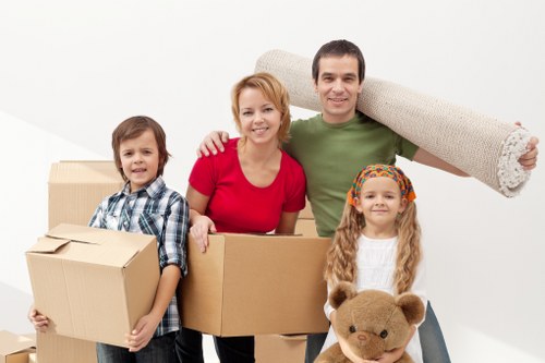 Office relocation setup with boxes and equipment for Chelsea removals