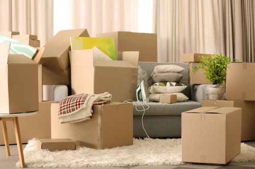 Local Chelsea movers loading household items into a van