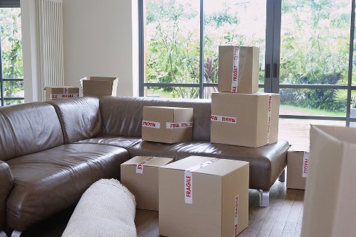 Local Chelsea moving truck handling furniture and boxes