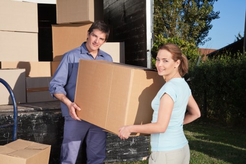 Professional team handling furniture pick-up in Chelsea apartment